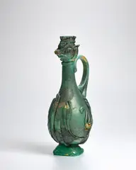 Ermanno Nason, Unique Caraffa Scavo con Testa, for Vetreria Gino Cenedese, opaque green scavo glass with applied decoration, gold foil, and applied with handle and circular foot