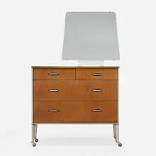 Raymond Loewy, Cabinet, c. 1955, walnut, aluminum, Bakelite, laminate, mirrored glass