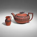 Wedgwood, Rosso Antico teapot and creamer, c. 1810, red stoneware with applied relief in black basalt