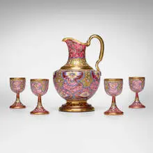 attribution Moser, Drink set with orchids and floral garlands, c. 1885, blown cranberry glass with enamel