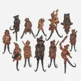 Black Forest, Collection of twelve carved whip holders, c. 1885, carved and varnished wood, horn, glass, brass