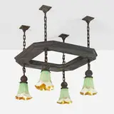 Quezal, Four-light chandelier with Pulled Feather shades, c. 1915, hand-blown glass, patinated brass