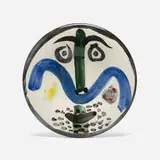 Face No. 130 plate by Pablo Picasso, 1963, glazed earthenware with engobe decoration and enamel, sold Feb 2014