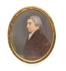 English School, A portrait miniature of Sir John Eden, 4th Baronet (1740-1812), in semi-profile, facing left, wearing a brown coat over his white waistcoat and chemise, his powdered wig tied with black ribbon., watercolour on ivory, gilt-metal mount, the plate on the reverse engraved, Sir John Eden/ of/ Windlestone