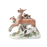 Meissen, Porcelain Hunting Group, polychrome enamel and gilded depiction of three dogs attaching a deer, underglaze crossed swords mark, ht