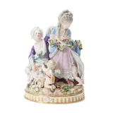 Meissen, Porcelain Allegorical Figure Group, polychrome enamel decorated and gilded with two maidens, cupid and a child hiding beneath a dress, underglaze crossed swords mark, ht