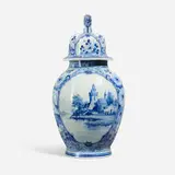 Delft, Covered urn with scenic cartouche and lion finial