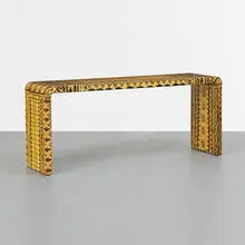 Karl Springer, console, c. 1975, lacquered batik fabric over wood