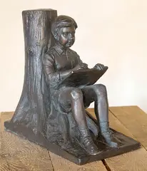 Reading Boy by David Bromley, cast bronze, sold Nov 2012