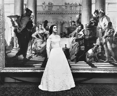 Bruno Benini, Catherine Patchell wearing Henry Haskin beaded 'Gown of the Year', National Gallery of Victoria, 1956, silver gelatin photograph
