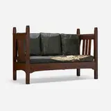 Early divan, model 165 by Gustav Stickley, c. 1901, chestnut, upholstery, sold Aug 2023