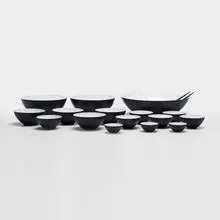 Herbert Krenchel, collection of sixteen Krenit bowls and two servers, 1953, enameled steel, melamine