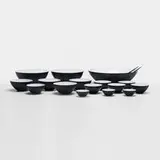 Herbert Krenchel, collection of sixteen Krenit bowls and two servers, 1953, enameled steel, melamine