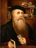 A scholar in his study by Northern Seventeenth Century Style, Scholar in Study, Oil on Paper, unsigned; handwritten label affixed to the reverse of the frame; indistinctly inscribed (in pencil on the reverse of the, sold Dec 2023