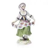 Meissen, Porcelain Figure of a Dancing Maiden, gilded and polychrome enameled figure posed holding her floral apron, crossed swords mark, ht