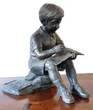 David Bromley, Boy Writing, bronze sculpture, 70 x 50 x 50cm