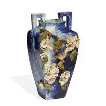 attribution Wheatley Pottery, large twin-handled earthenware vase with three-dimensional decoration of apple blossom branch among which sits a small bird