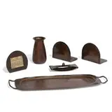 group of desk articles, six: two-handled tray, vase, blotter, perpetual desk calendar and bookends, pair by The Roycrofters & Roycroft, sold Apr 2022