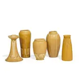 group of matte glazed porcelain articles in yellow, five by Rookwood Pottery, sold Apr 2022