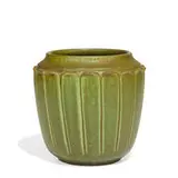 earthenware jardiniere with hand-modeled leaves under a mottled, slightly crystalline glaze, shape number 180 by Rookwood Pottery, sold Apr 2022