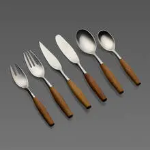 Fjord flatware by Jens Quistgaard, 1953, stainless steel, teak, sold Jul 2021