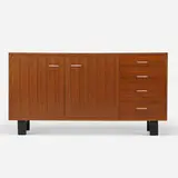 Cabinet by George Nelson & Associates, c. 1952, walnut, lacquered wood, aluminum, sold Jul 2021
