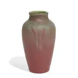 earthenware vase in green over rose glazes, with repeating stylized floral decoration, shape number 2110 by Rookwood Pottery, sold Apr 2022