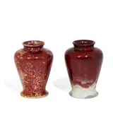 Moorcroft Pottery, possibly experimental earthenware Sang-de-boeuf (Oxblood) glaze mini vases, two, shape number M22