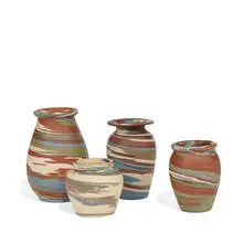 Niloak Pottery, group of Mission Swirl vases, four