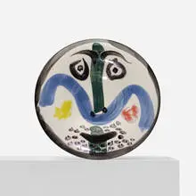 Face No. 130 plate by Pablo Picasso, 1963, glazed earthenware with engobe decoration and enamel, sold Apr 2013