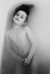 James Baker Hall, Matthew in the Tub, c. 1972, Gelatin silver print; identified on an inscription on the back of mat in an unknown hand; mounted and matted