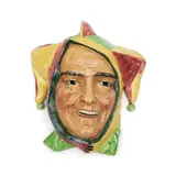 Royal Doulton Jester Character Mask, Untitled, 1936, polychrome enamel decorated and modeled with a toothy smile, HN1630 and printed mark, lg