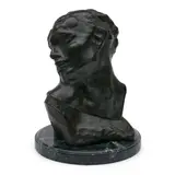 Auguste Rodin, Reproductive Copy of Tête de la Luxure, a later casting, Bronze with green/brown patina