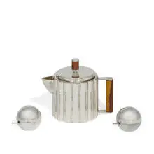 attribution Ilonka Karasz, teapot, together with a pair of salt cellar, spoon and pepper shaker sets by Napier