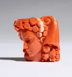 Carlo Parlati, Coral carving depicting an allegorical female figure, Entirely carved from a single branch of Cerasuolo coral (Corallium elatius) of exceptional chromatic quality.