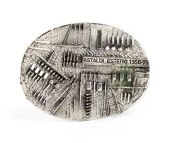 Arnaldo Pomodoro, Commemorative silver plaque, 1975, oval in shape. The work bears the inscription ASTALDI ESTERO