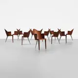 Philippe Starck, Royalton dining chairs, set of twelve, 1988, pau rosa plywood, cast aluminum