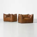 Mario Bellini, Le Bambole chairs, pair, 1972, buffalo leather
