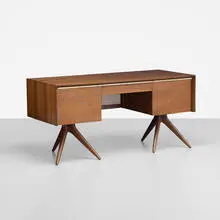 Vladimir Kagan, desk, c. 1955, walnut and ebonized wood, brass, cane