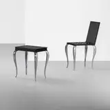 Philippe Starck, Lola Mundo chairs, pair, 1988, mahogany, cast aluminum, rubber