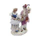 Meissen, Porcelain Figure of a Couple Dancing, polychrome enamel decorated and gilded, the figures posing and holding a flower garland, underglaze crossed swords mark, ht