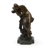 Luca Madrassi, Bronze female figure resting seated on a trunk, two-toned patina, mounted on a green marble base, signed L. Madrassi and the stamp of the B.D.Vrai Bronze-Paris foundry, ht.  13 in., Bronze female figure resting seated on a trunk, two-toned patina, mounted on a green marble base, signed L