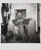 Topless Dancer in her Dressing Room, San Francisco, Cal. 1968 by Diane Arbus, Gelatin silver print, sold May 2012