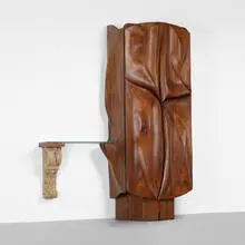 Phillip Lloyd Powell, illuminated bar cabinet, 1967, laminated and carved walnut, glass, slate, brass, found objects