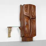 Phillip Lloyd Powell, illuminated bar cabinet, 1967, laminated and carved walnut, glass, slate, brass, found objects