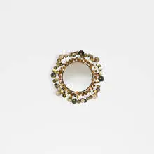 C. Jeré, mirror, 1976, enameled steel, copper, brass, mirrored glass