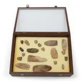 nineteen assorted shapes and sizes, lg. 1 1/2 to 8 in.; with a mahogany framed case. by Boxed Collection of Stone Specimens, sold Apr 2023
