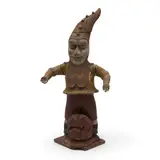modeled standing and with outstretched arms, ht.  24 in. by Carved and Painted Wood Gnome, sold Apr 2023