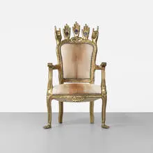 Armchair with hands by Pedro Friedeberg, 1990, carved and gilt wood, hair-on-hide, compasses, sold Sep 2012