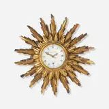 Lepaute, Sunburst wall clock, c. 1960, gilt wood, enameled steel, glass, brass